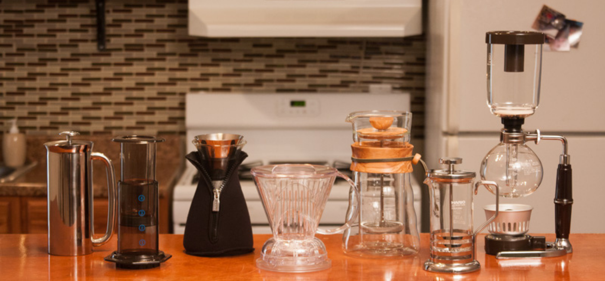 luwak coffee brewing equipment on a kitchen counter.