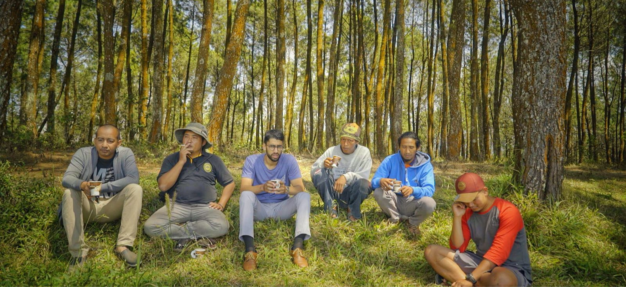 Kaya Kopi workers enjoying freshly brewed Luwak coffee at the coffee farm
